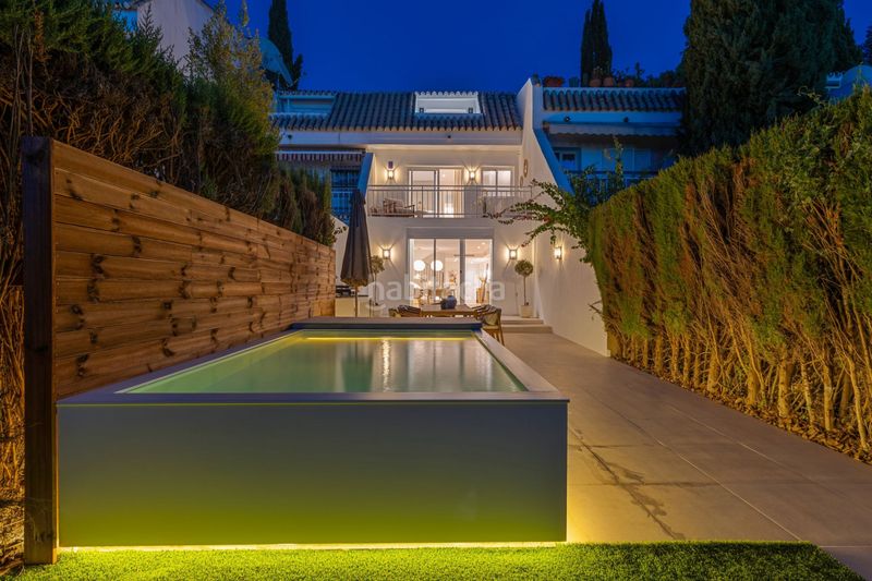 Foto b08c29b7-1732-4e37-a929-ccd9d471e995. Casa adossada amb piscina a Nagüeles Alto Marbella