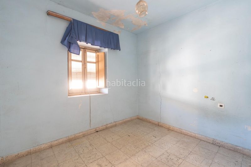 Foto 26f54cd6-f609-4269-94a2-7455379b534f. Casa aparellada a Alfacar