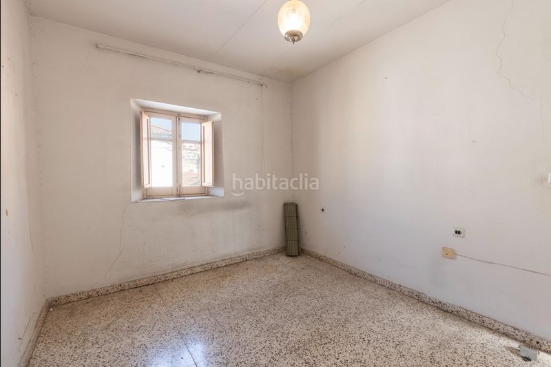 Foto 384c9875-6154-40e3-8175-778e59751b35. Casa aparellada a Alfacar