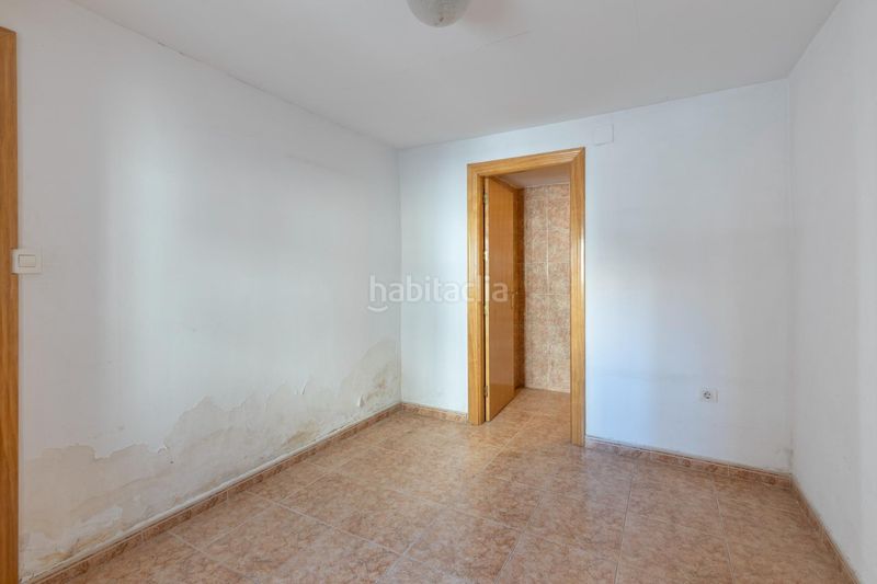 Foto 38561c10-7ef9-4bc3-a1b8-77956b2e77a7. Casa aparellada a Alfacar