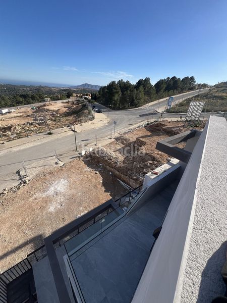 Foto 2d17a903-0d5f-4337-a79a-b8e789be0c26. Casa aparellada amb aparcament piscina a balcón de ponoig - Polop paradis - Polop hills Polop