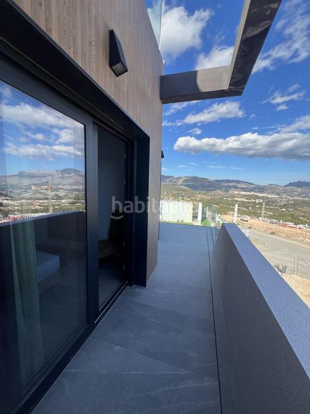 Foto f207a82c-bc68-4d54-90c3-e5f65afb8ba1. Casa aparellada amb aparcament piscina a balcón de ponoig - Polop paradis - Polop hills Polop