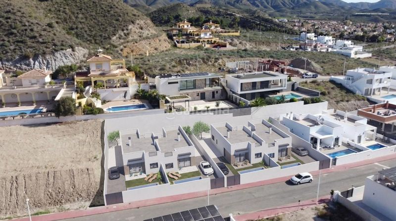 Foto 4a450ceb-2f70-4ba2-93b5-0455f890b0c4. Casa aparellada amb aparcament piscina a Mazarrón casco urbano Mazarrón