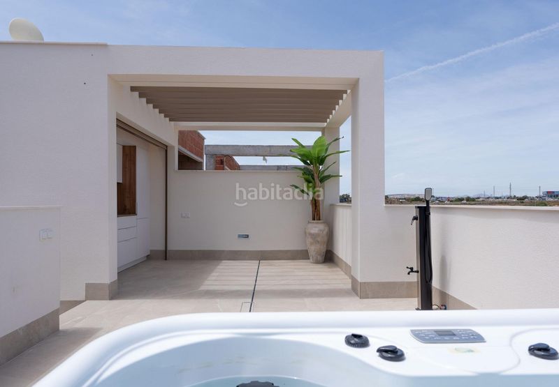 Foto d5b367ea-1114-4aae-b34e-92b56b8f4e38. Casa aparellada amb aparcament piscina a Las Lomas de Rame-Bahía Bella Alcázares (Los)