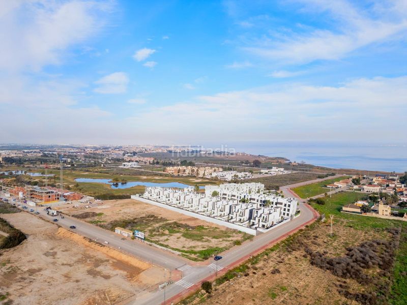 Foto def49469-5e55-4628-882d-a563428c6c90. Casa aparellada amb aparcament piscina a Las Lomas de Rame-Bahía Bella Alcázares (Los)