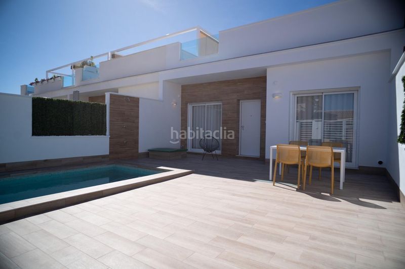 Foto 1e875d64-6a8b-4c46-9e52-11d59e85d1d1. Casa adossada amb aparcament piscina a San Javier San Javier