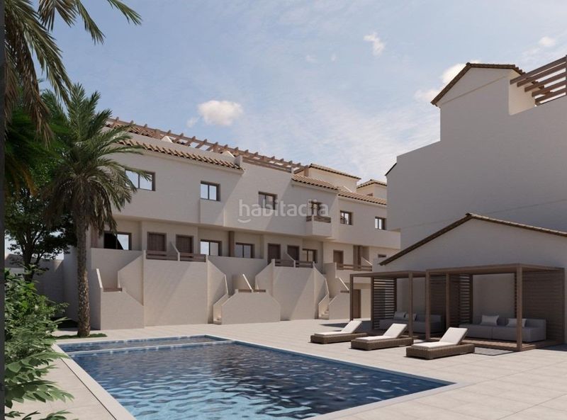 Foto 6905a39a-c8bb-4613-a397-2295edb73495. Casa adossada amb aparcament piscina a Portmán Unión (La)