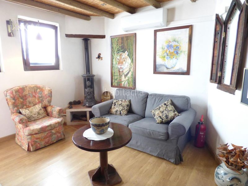 Foto 1a4d0d95-3f17-4e51-8bb5-1811903f7322. Casa amb xemeneia a Canillas de Aceituno