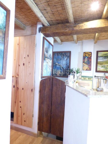 Foto df7fa18f-cc95-456e-ac5d-3be524db441c. Casa amb xemeneia a Canillas de Aceituno