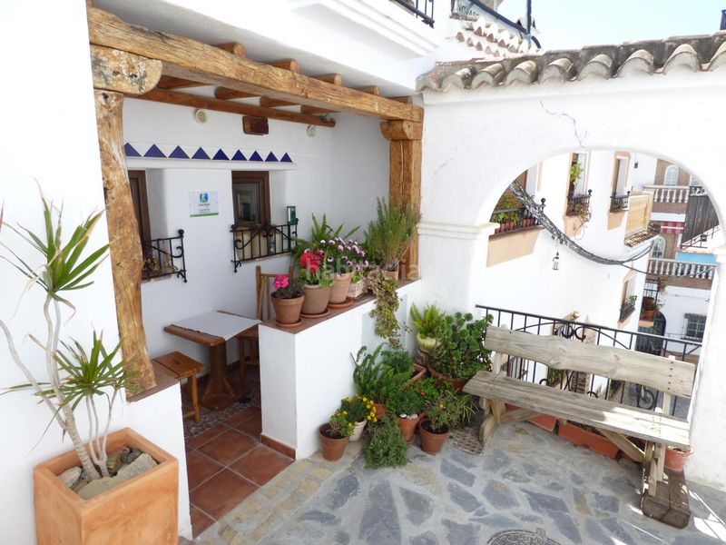 Foto e1eea1d4-f374-4dba-9b37-dc169f89573e. Casa amb xemeneia a Canillas de Aceituno