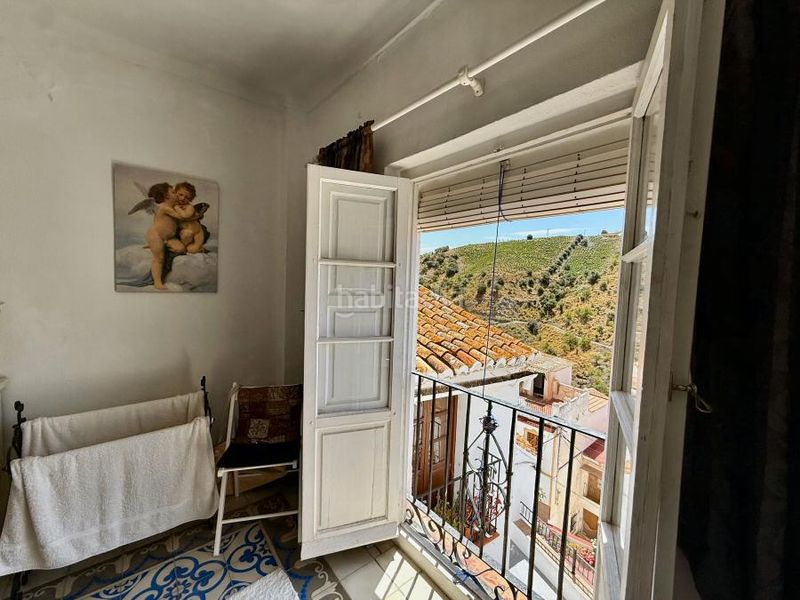 Foto ba897f44-bc70-407b-bd16-aed4c6664705. Casa aparellada amb piscina a Almáchar