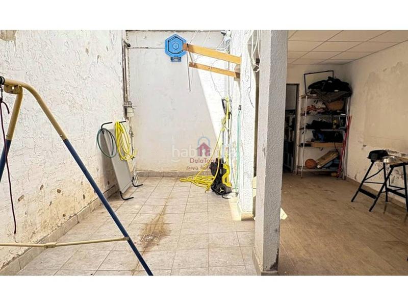 Foto 0b1e74a5-b7d5-43f8-8fa1-c44e617a1ef6. Casa pareada casa en en venta ca naurell de 210m construidos con salida a patio, dos terrazas y garaje. en Terrassa