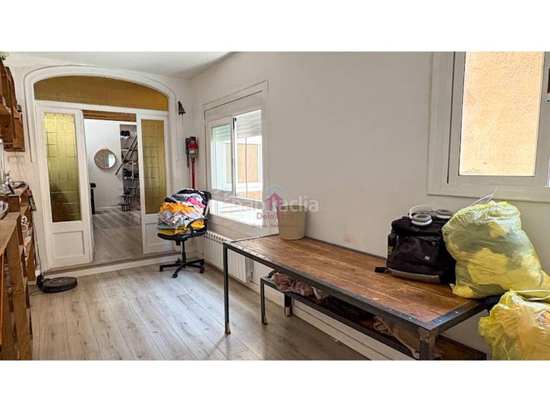 Foto 2a4f821f-f4ce-4a1a-9d09-58a784c35cf0. Casa pareada casa en en venta ca naurell de 210m construidos con salida a patio, dos terrazas y garaje. en Terrassa