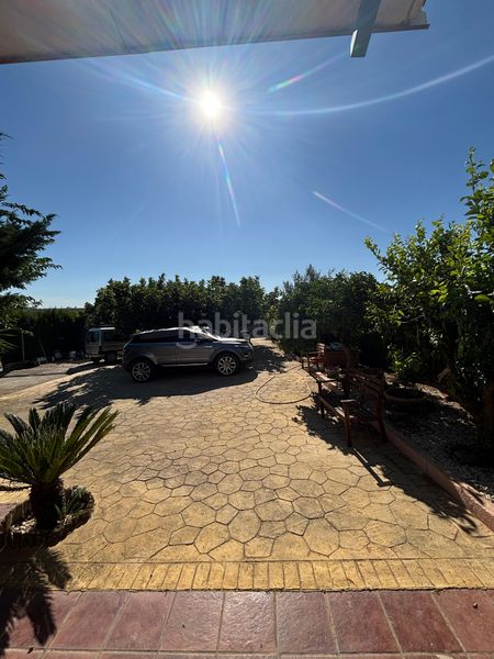 Foto ded8e906-0ef2-428c-9431-ea12e133b1e4. Masia amb xemeneia aparcament piscina a Almensilla