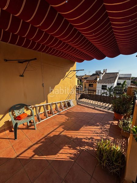 Foto eb8aef53-c8bf-42b0-9b20-b4b172430e78. Casa aparellada amb aparcament piscina a Centro Bormujos