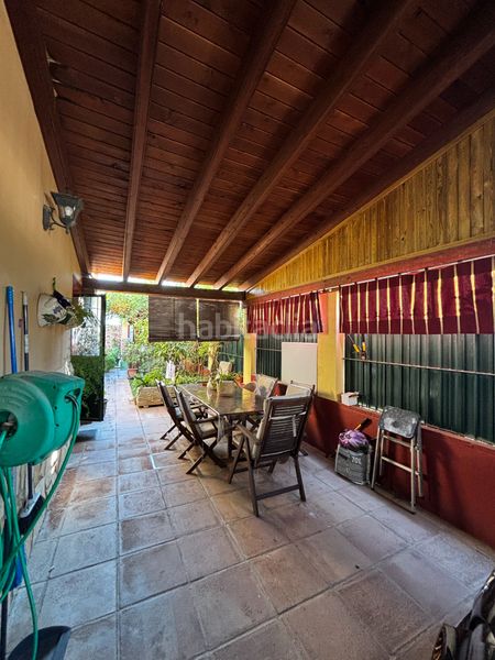 Foto fb6a27f3-324e-43a7-913d-10abe52068c3. Casa aparellada amb aparcament piscina a Centro Bormujos