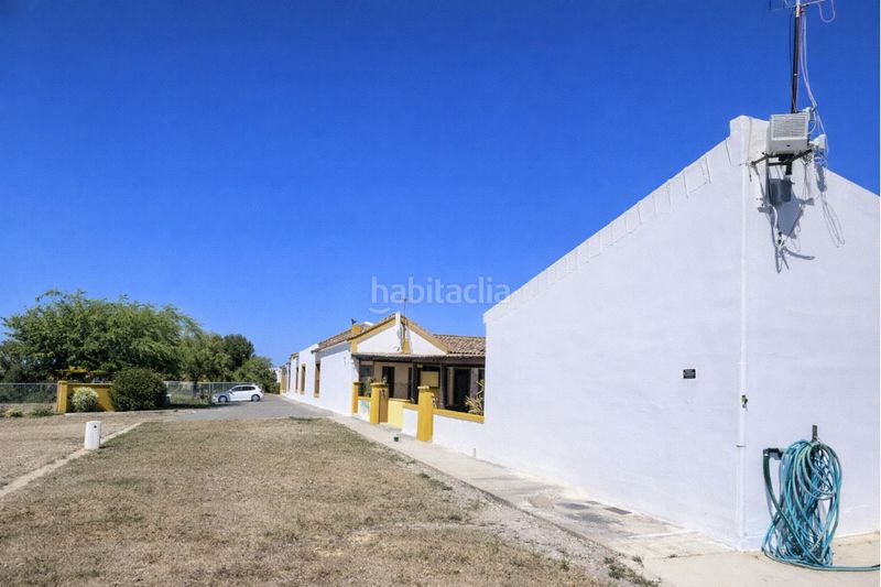 Foto 7139136f-092b-44d0-ba5f-0637b8336e94. Finca rústica a La Calzada - La Florida Sevilla