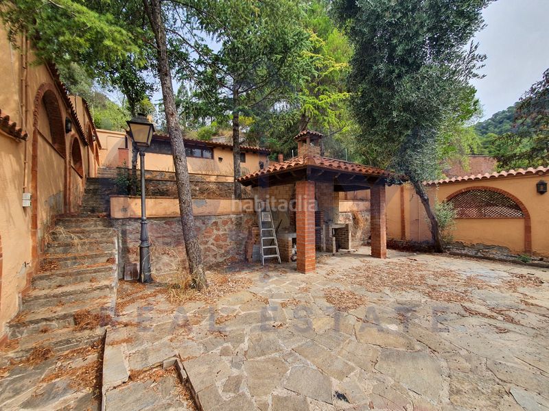 Foto 27ac86a5-c030-4013-b05f-d8f457f712f9. Casa aparellada amb xemeneia aparcament piscina a Vacarisses