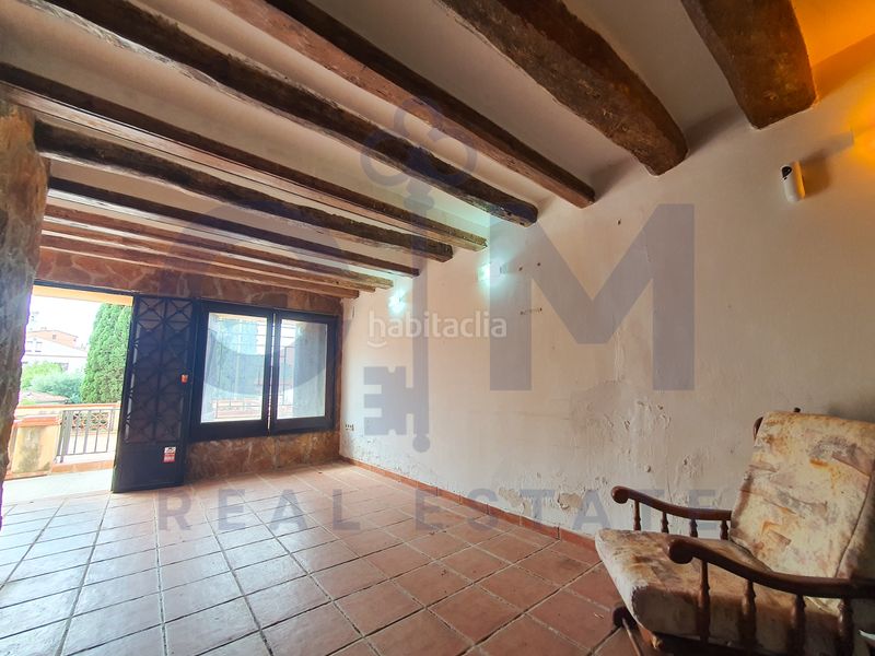 Foto 87e2421b-8859-4f3f-8384-40ec188f7136. Casa aparellada amb xemeneia aparcament piscina a Vacarisses