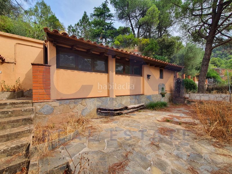 Foto bd38a953-6d84-4f90-bd60-eca6bbac4ae4. Casa aparellada amb xemeneia aparcament piscina a Vacarisses