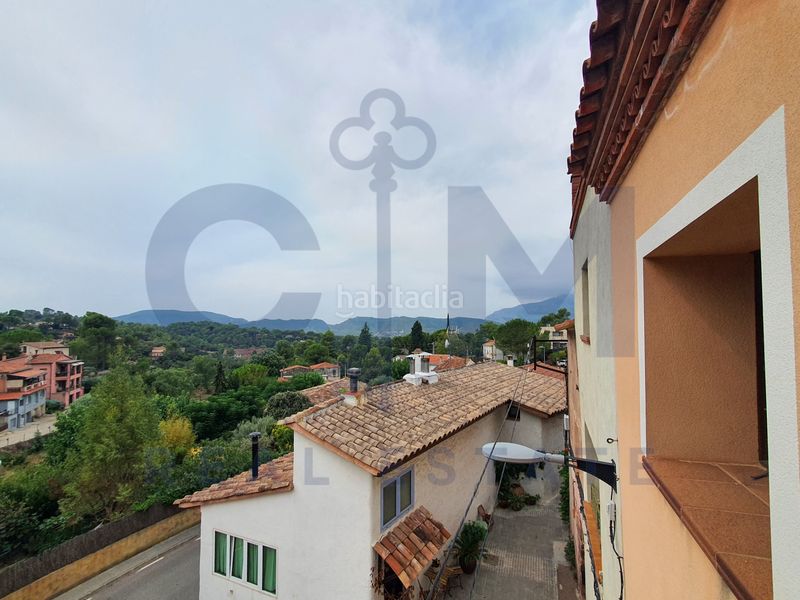 Foto c0b620f5-420c-4185-bd97-12218b1830b7. Casa aparellada amb xemeneia aparcament piscina a Vacarisses