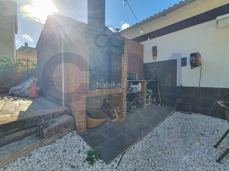 Foto 56870c39-c8ec-4323-b1b4-91a1e2358e22. Casa adossada amb xemeneia calefacció aparcament a Vallgorguina