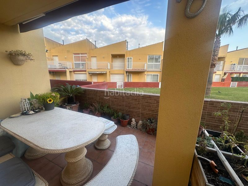 Foto 12db1c9c-0f47-485e-a70e-14b464693d50. Casa adossada amb aparcament piscina a Centre Miami Platja