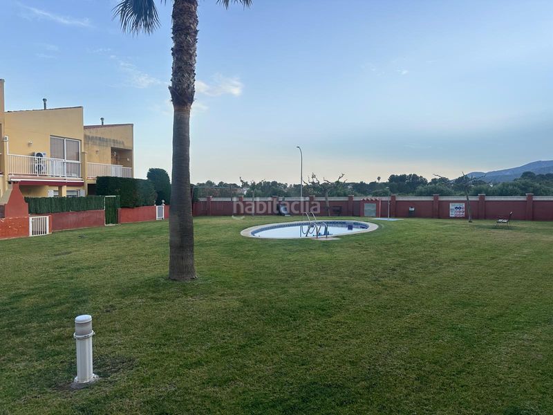 Foto 38ad0d7a-6ad1-4394-b515-fb931541979a. Casa adossada amb aparcament piscina a Centre Miami Platja