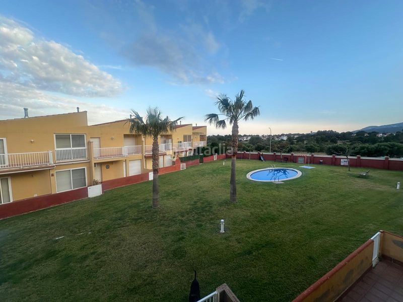 Foto 9f7bff2d-626d-41f9-888a-f6507fb28836. Casa adossada amb aparcament piscina a Centre Miami Platja