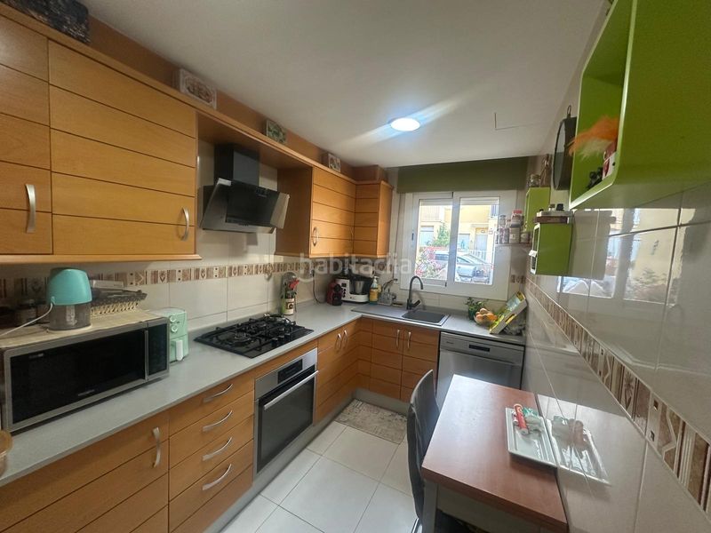 Foto cbae6452-25cb-4c97-a8ab-84d717f42d27. Casa adossada amb aparcament piscina a Centre Miami Platja