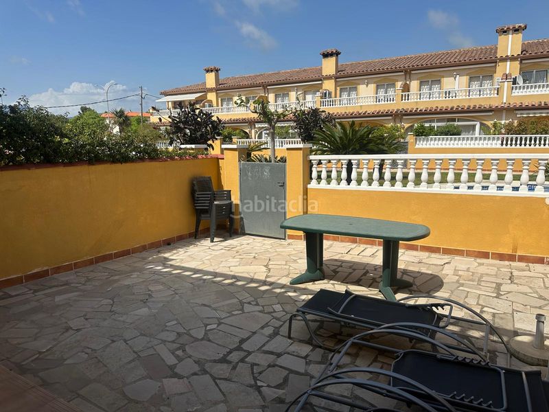 Foto 4a68bb58-1cc1-4153-8091-a88b0a791d97. Casa adossada amb aparcament piscina a Centre Miami Platja