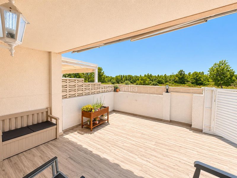 Foto 01954ce0-66ef-4462-9792-325bd31d5658. Casa adossada amb aparcament a Centre Miami Platja
