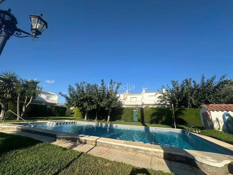 Foto 02837609-db8c-456c-b476-8583b63a228f. Reihenhaus mit kamin heizung parking pool in Centre Miami Platja