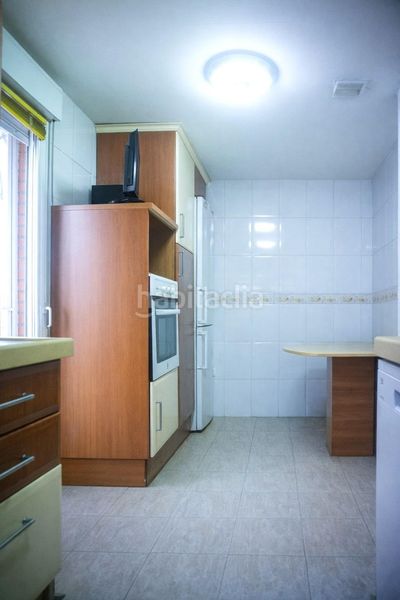 Foto 5c66d83f-5f53-49f1-96f8-9b64ab5d1d90. Casa aparellada amb calefacció aparcament piscina a Rivas - Vaciamadrid