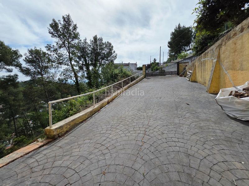Foto a70d08bf-3f74-42e4-906e-667f9e11f357. Casa amb calefacció aparcament piscina a Vallirana