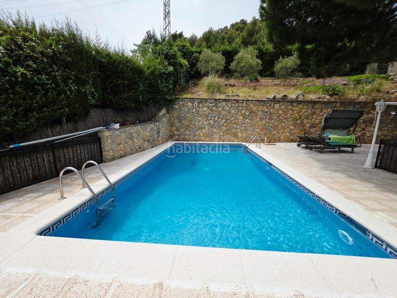 Foto 04eace9f-3835-45fc-86af-19bf743007a7. Casa amb xemeneia calefacció aparcament piscina a Vallirana