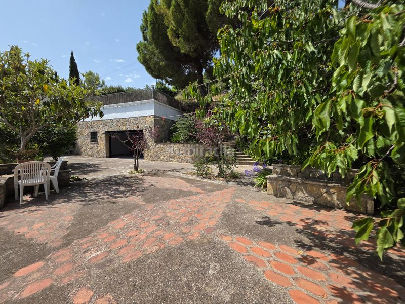 Foto 1f011436-9cda-4e0b-997e-d39e8a611c43. Casa amb xemeneia calefacció aparcament piscina a Vallirana