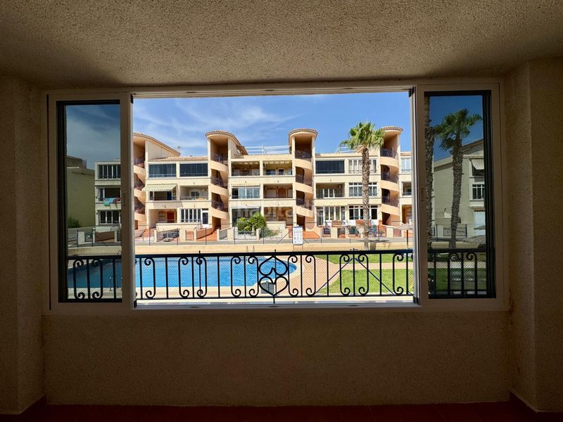 Foto f9e12510-09fb-4c0a-a85e-da5495b52df7. Apartament amb piscina a Los Balcones y los Altos Orihuela