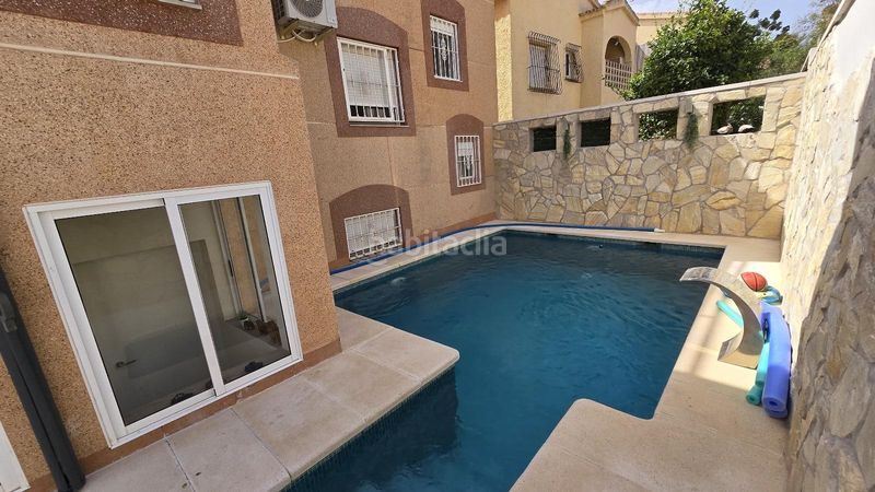 Foto 5eaf0b83-9b86-4411-bb6c-cf00027e61c0. Casa adossada amb aparcament piscina a San Fulgencio