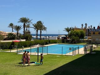 Appartement à Punta Prima. Apartamento con vistas al mar a solo 40 m de la playa  punta pri