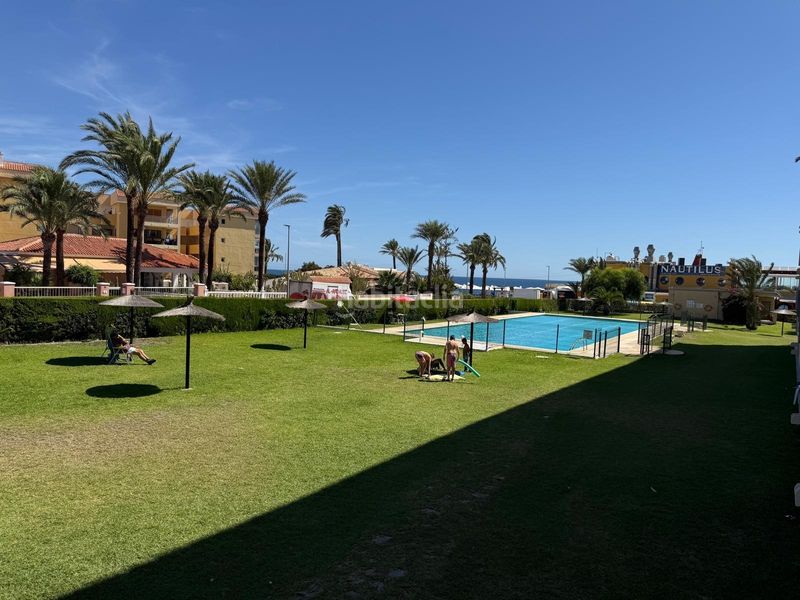 Foto c3b0ee86-73a6-4d33-a2e6-8ed0115db861. Apartament a Punta Prima Torrevieja