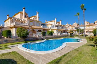 Àtic a Playa Flamenca. Casa adosada con orientación sur en venta en playa flamenca  ori