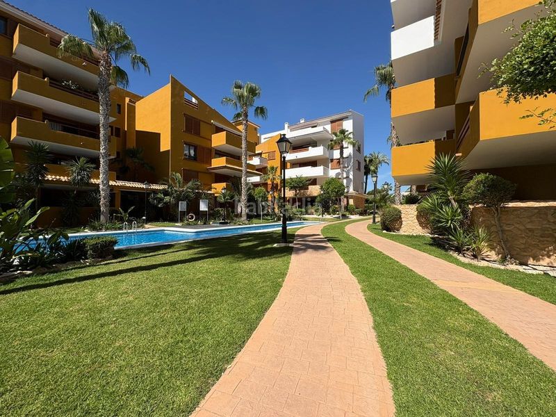 Foto 51234224-1bb0-4db6-a548-c426b6736d79. Apartament amb aparcament a Punta Prima Torrevieja