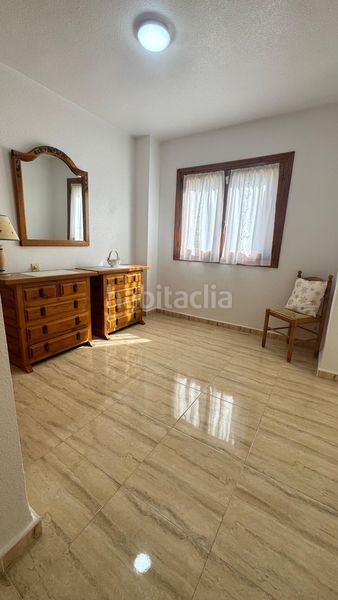 Foto 0c23592e-dd5c-4626-be4e-f352bd24421a. Casa adossada a Playa Flamenca Orihuela
