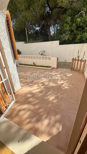Foto 45838925-3752-41ab-85fe-6fa287d09b2c. Casa adossada a Playa Flamenca Orihuela