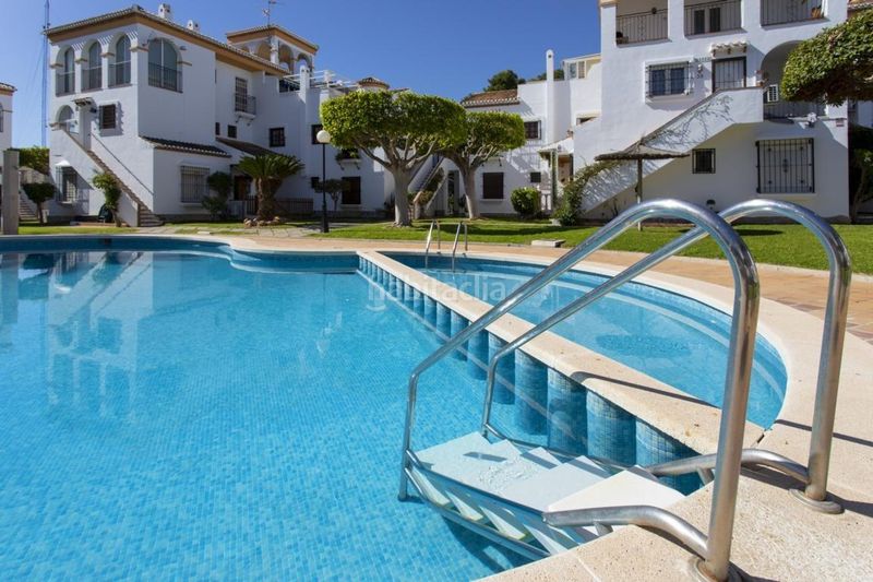 Foto 08dbaca5-10f3-411d-abf2-fd8c8fe8cd9f. Casa amb aparcament a Playa Flamenca Orihuela
