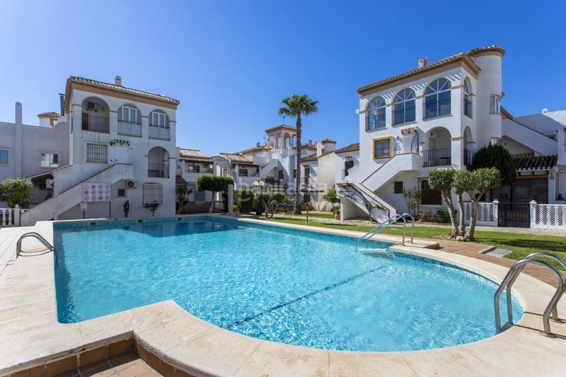 Foto 0e785aaa-7472-4872-9f0f-a5658048ffe0. Casa amb aparcament a Playa Flamenca Orihuela