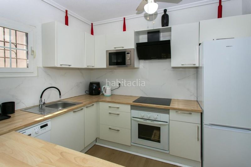 Foto 1b3cff43-585e-40e4-b017-c841e94df9b2. Casa amb aparcament a Playa Flamenca Orihuela