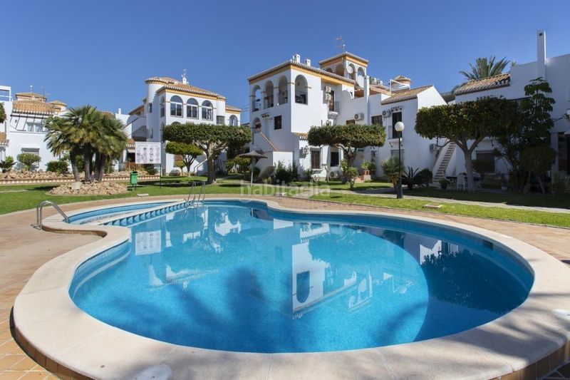 Foto 4f2ac050-d579-4c7e-8aaf-cdd655b4e480. Casa amb aparcament a Playa Flamenca Orihuela