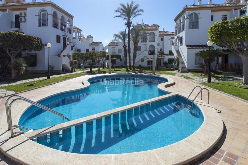 Foto 5d6ca001-b708-46b4-b6d3-ca3b34a89e44. Casa amb aparcament a Playa Flamenca Orihuela